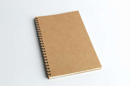 blank cover spiral notebook on white background for mockup blank templateの写真素材