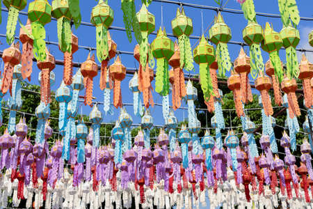 colorful hanging lanterns lighting in loy krathong and new year festival at northern of thailandの写真素材