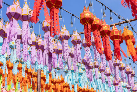 colorful hanging lanterns lighting in loy krathong and new year festival at northern of thailandの写真素材