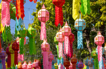colorful hanging lanterns lighting in loy krathong and new year festival at northern of thailandの写真素材