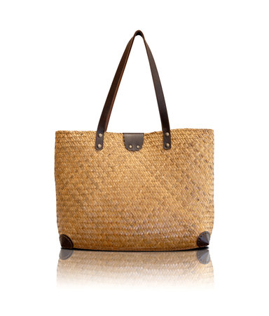 wooden woven bag or wicker bag isolated on white backgroundの写真素材
