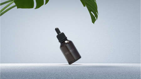 Dropper glass bottle of cosmetic on nature podium scene ,3d rendering.の写真素材