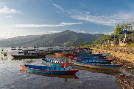 peddle boat in Phewa lake in the eveningのeditorial素材