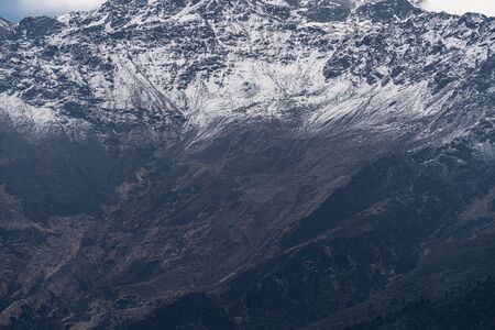 mountain peak cover by cloud at poon hill trekking route with planeの写真素材