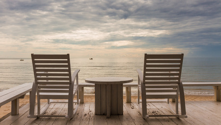 Hua-Hin vacation sunrise concept with beach chair and sea viewの写真素材