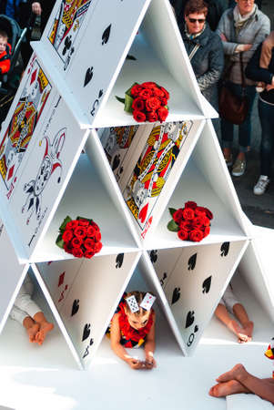 Genk, Belgium - May 1st 2019: Playing cards themed float passing through Grotestraat during O-paradeのeditorial素材