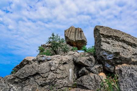 Unseen Thailand of In Kwaen at Khao Chong Sadet Kanchanaburi, A large stone on the top of the mountainの写真素材
