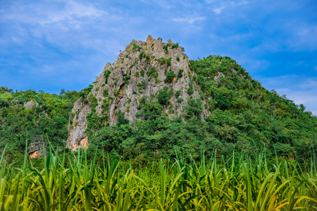 Landscape of Mountain Khao Chong Sadet Kanchanaburi Thailand, Mountain with Cloud and Blue Skyの写真素材