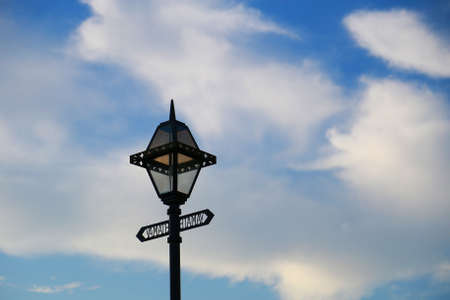 Sunny day sky and street lightsの写真素材