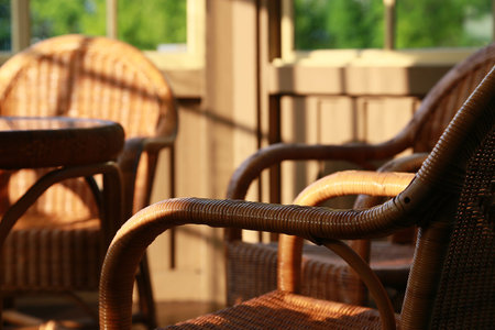 Room with rattan chairs and tables