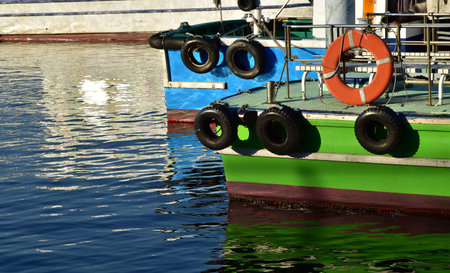 The ship is anchor blue and green