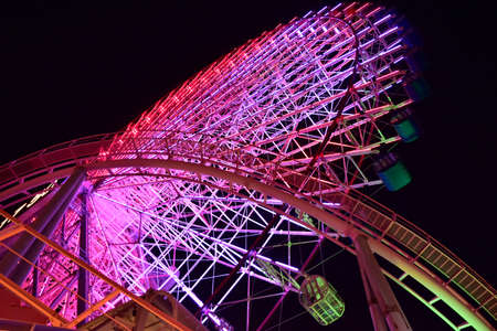 Night view of the lights of the Ferris wheel in the Parkの写真素材