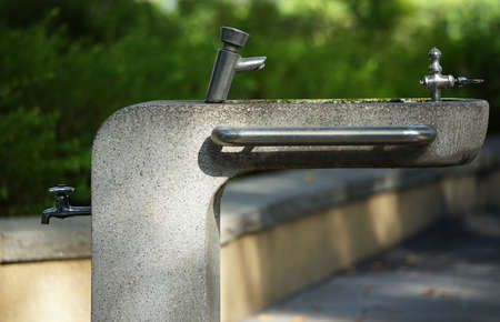 Faucet of the drinking fountain in the park which cleared upの写真素材
