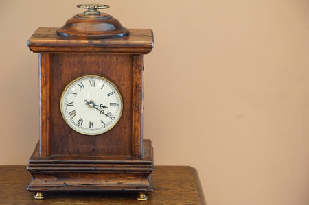 Clock on the tableの写真素材