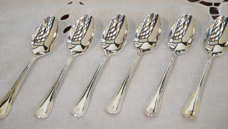Plenty of spoons on the table side by sideの写真素材