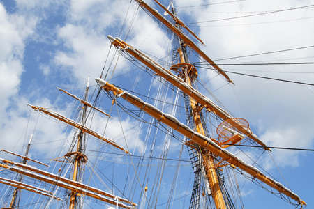 Clear blue sky and sail boat mastの写真素材