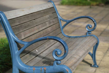 Bench of the blue in the park where it was fineの写真素材