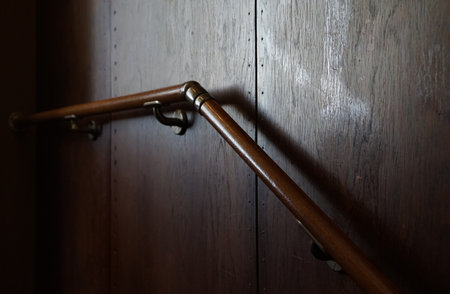 Handrail on the wall of the stairs of the houseの写真素材