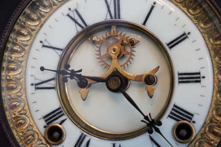 The dial of an old clock in the roomの写真素材