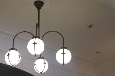 Spherical shape light on the ceiling of the room at night