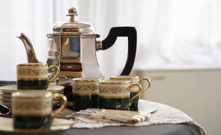 Silverware for drinks tea on the tableの写真素材