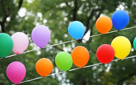 Colorful balloons displayed in the festival squareの写真素材