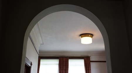 Lighting in the ceiling of a room with a window