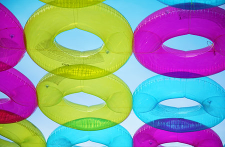 Colorful ring of vinyl floats decorated in the sky of the festivalの写真素材