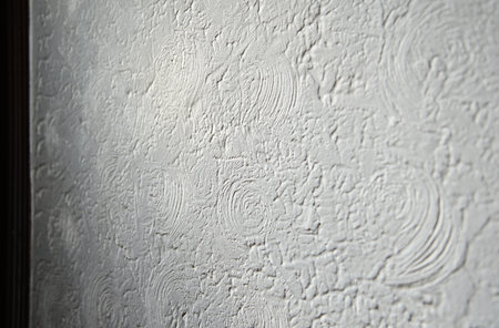 White plaster on the wall as a background. Texture of white plaster.の写真素材