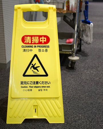 Restroom cleaning in progress sign placed at the entrance