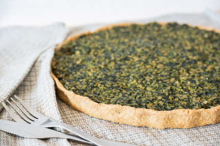 Homemade  shortcrust pastry quiche with tofu and spinachの写真素材