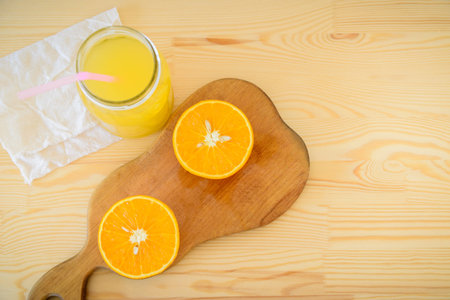 orange juice on the tableの写真素材