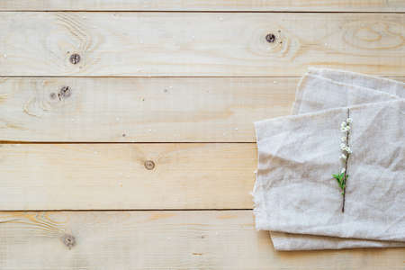 top view blooming branch spirea on wooden backgroundの写真素材