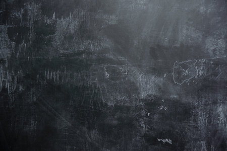 background of Empty black slate wall or schoolboardの写真素材