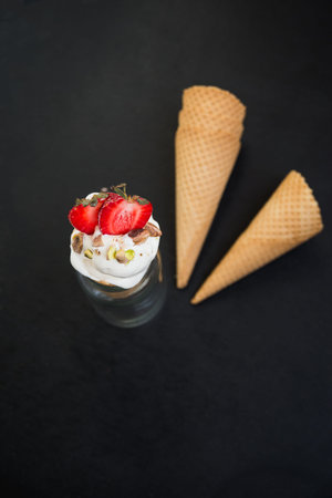 ice cream with fresh strawberry and pistachio nuts