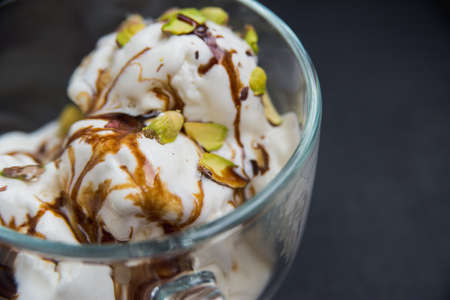 ice cream with pistachios in a mug, macroの写真素材