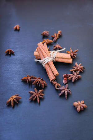 cinnamon and star anise on a dark blue backgroundの写真素材