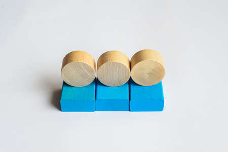 wooden squares and circles on white background with copy spaseの写真素材