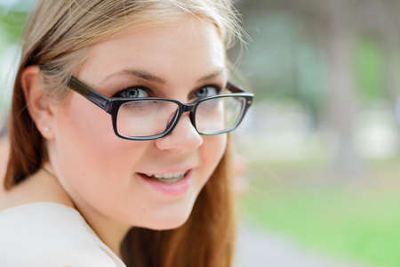 Portrait of beautiful  blonde girl on the natureの写真素材