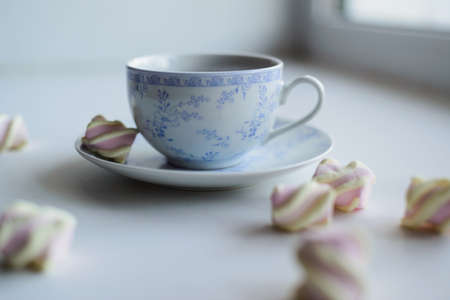hot cup of red tea with marshmallow, tenderness conceptの写真素材