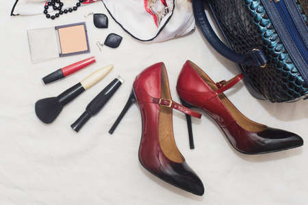 top view flat lay of accessories of a woman to partyの写真素材