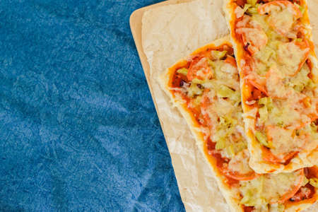 Homemade vegetarian rectangular pizza for a family dinnerの写真素材