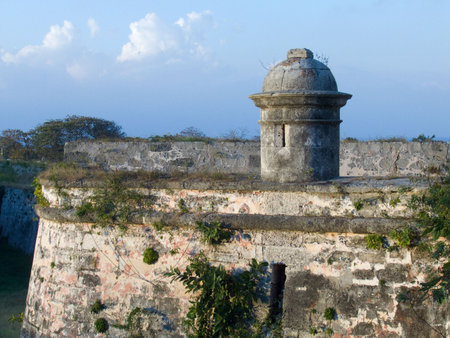 Tower in La Cabaña Fortress, in a wall with plants. Havana, Cubaの写真素材