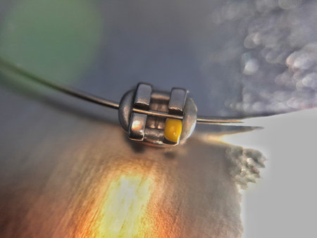 A closeup shot of a metal object with a blurred background
