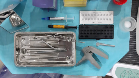Dental tools and instruments on a table in a dentist's office