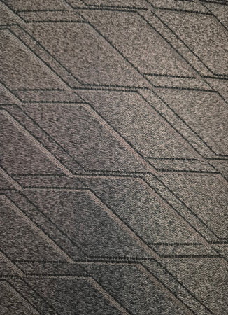 Texture of black and gray fabric as background, close-up.