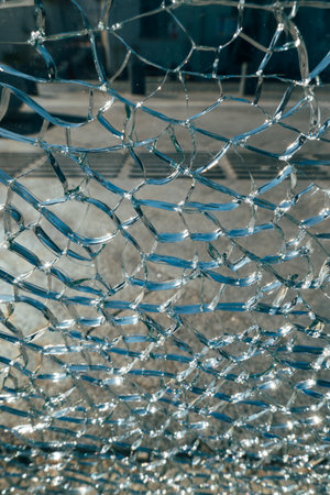 Shattered Glass Background with Net Pattern and Close-up Detailsの写真素材