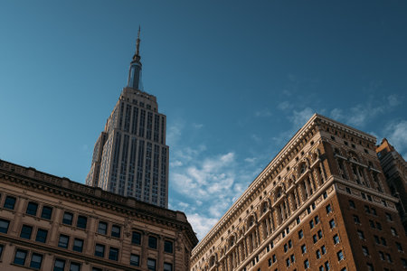 The Empire State Building Towering Over Classic New York Architectureの写真素材