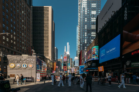 NEW YORK, USA - SEPTEMBER 26TH 2023: Busy day in Times Square, New York City with skyscrapers and...
