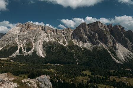 Behold the Stunning View of the Dolomites Mountains Set Against a Dramatic and Captivating Sky Aboveの写真素材